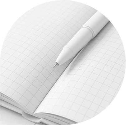 Pen resting on an open journal for self reflection